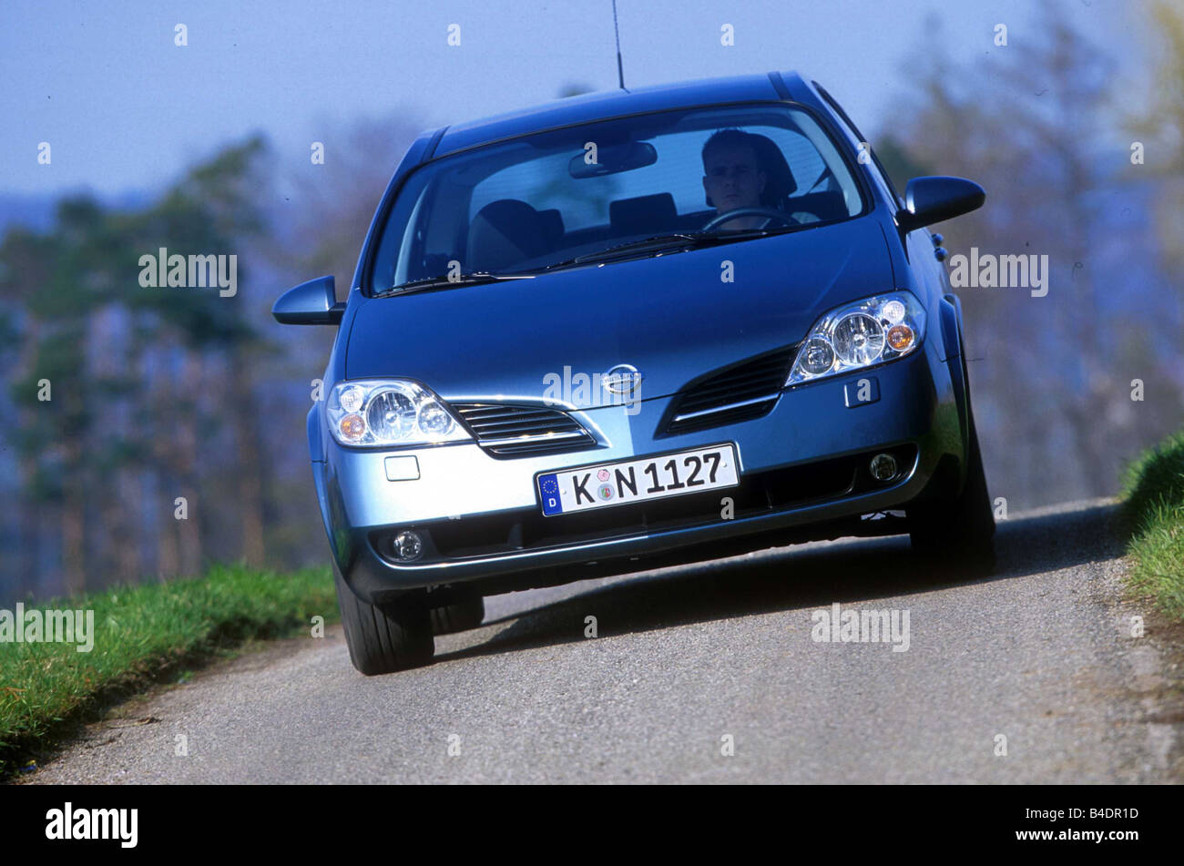 Car, Nissan Primera Traveller 1.8, Limousine, hatchback, medium class, model year 2001-, silver, driving, country road, diagonal Stock Photo