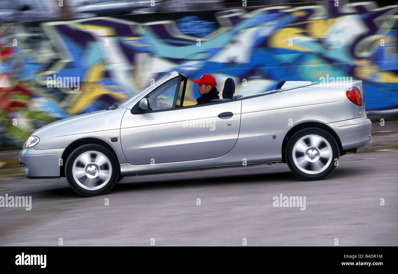 Car, Mégane Convertible 2.0 16V, model year 1999-, open top, silver, driving, side view Stock - Alamy