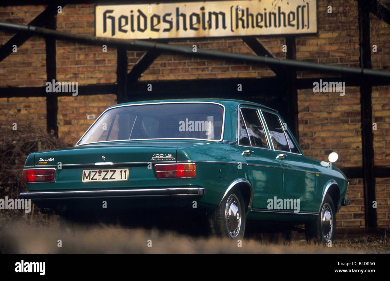 Car, Audi 100 LS, model year 1968-1976, Vintage approx., Youngtimer, sixties, The 70s, Limousine, four-door, bluish green, stand Stock Photo