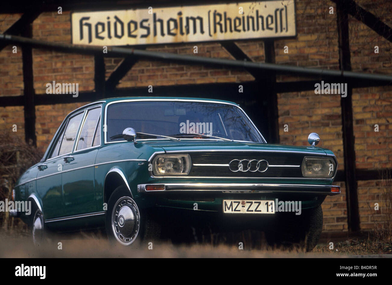 Car, Audi 100 LS, model year 1968-1976, Vintage approx., Youngtimer, sixties, The 70s, Limousine, four-door, bluish green, stand Stock Photo