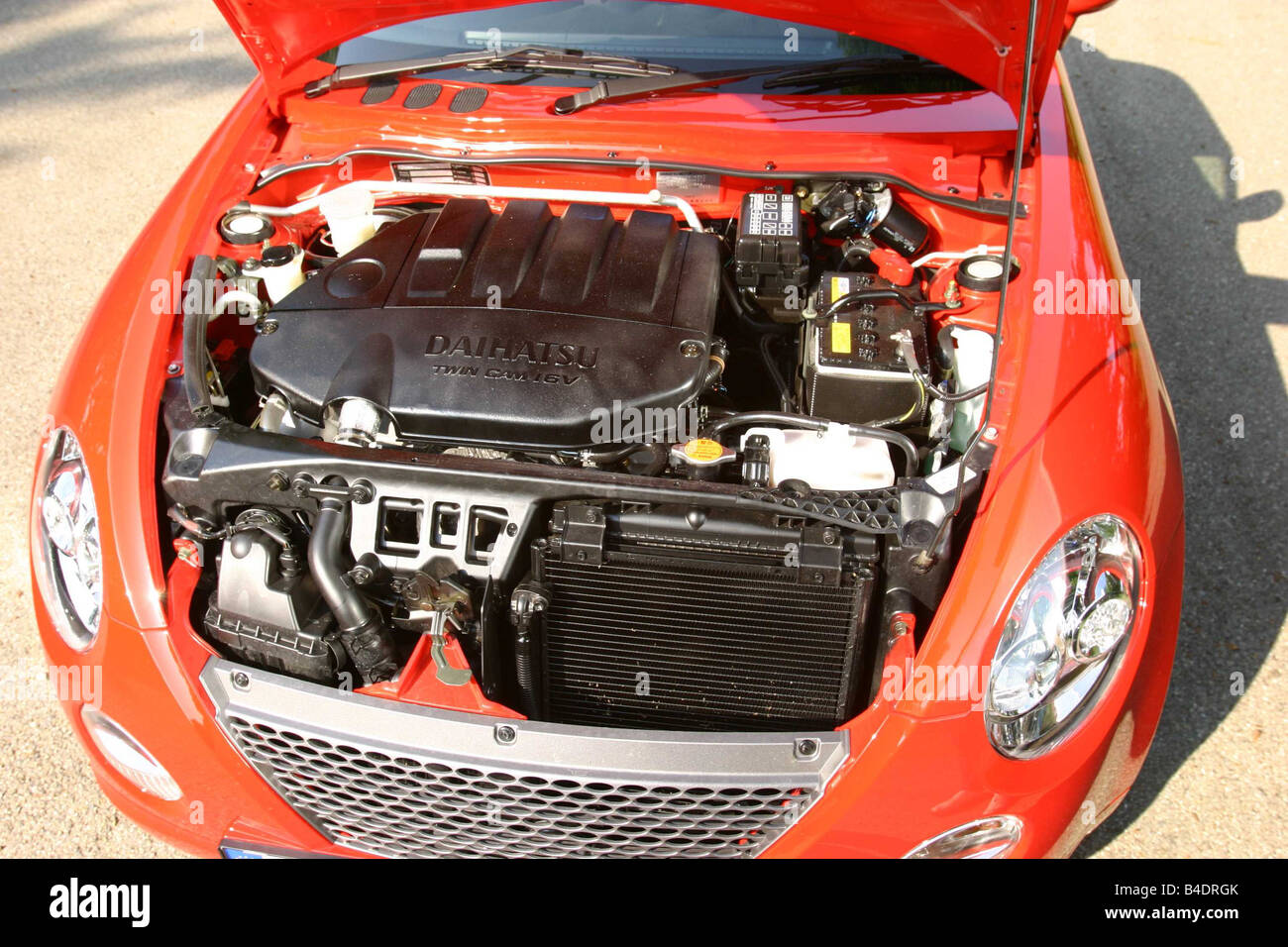 Car, Daihatsu Copen, Convertible, model year 2003-, red-orange , open top, view in engine compartment, engine, technique/accesso Stock Photo