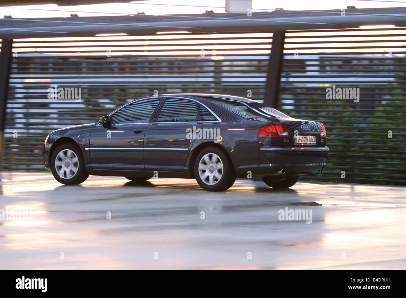 Car, Audi A8 3.7 quattro, Limousine, black, model year 2002-, diagonal from the back, side view Stock Photo