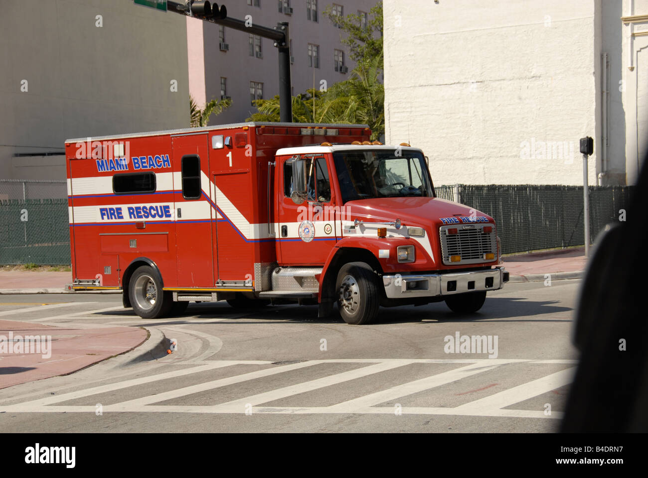 Fire rescue vehicle speeding to emergency. Stock Photo