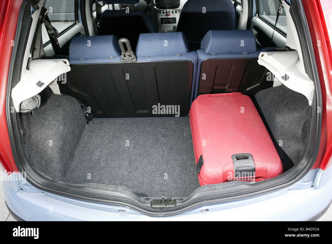 Car, Fiat Punto 1.3 JTD, small approx., Limousine, light blue-metallic,  view into boot, technique/accessory, accessories Stock Photo - Alamy