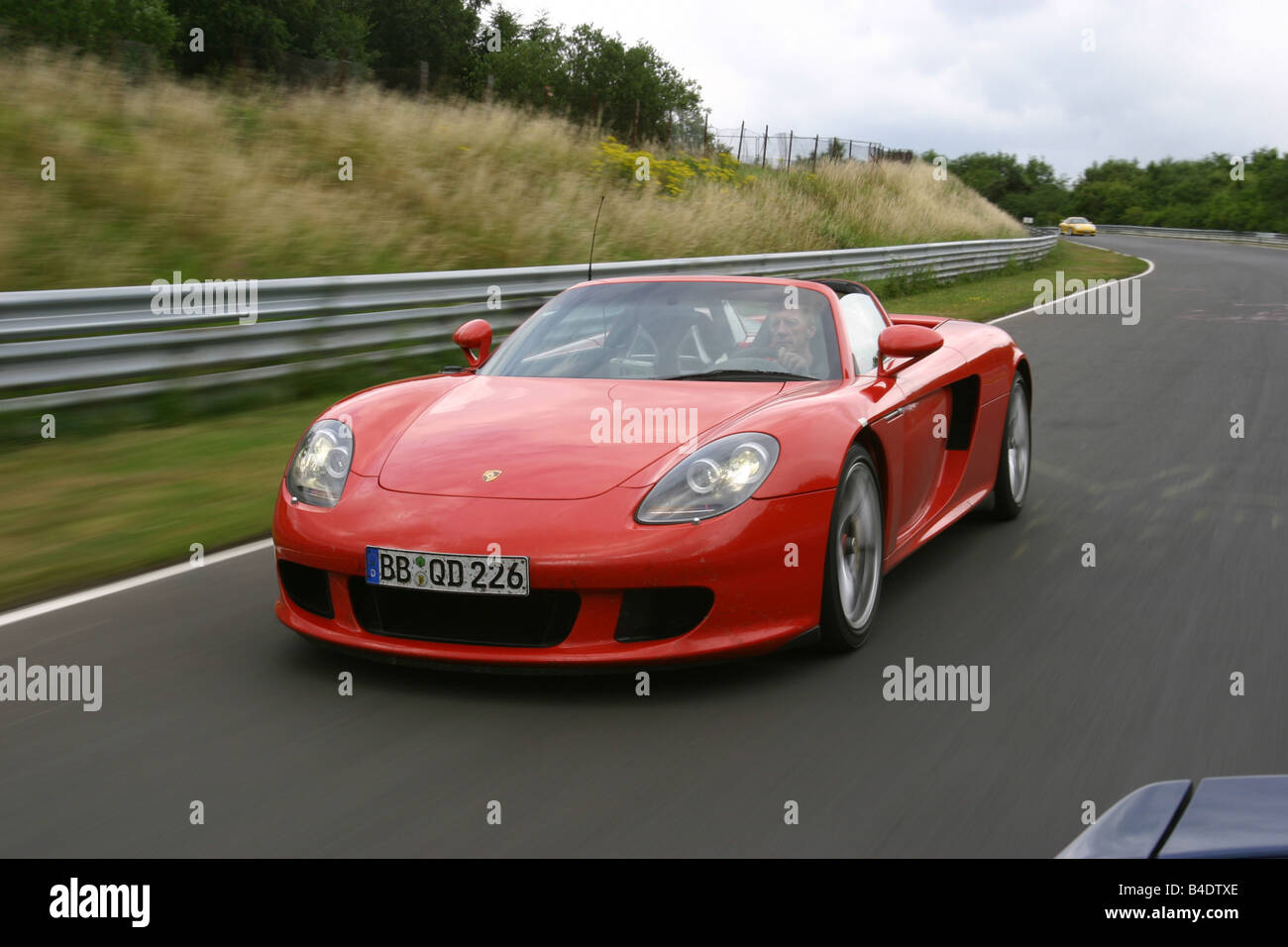 Car, Porsche Carrera GT, model year 2003-, Convertible, red, Test approx.s,  612 PS, Höchstgeschwindigkeit 330 km/h, open top, dr Stock Photo - Alamy