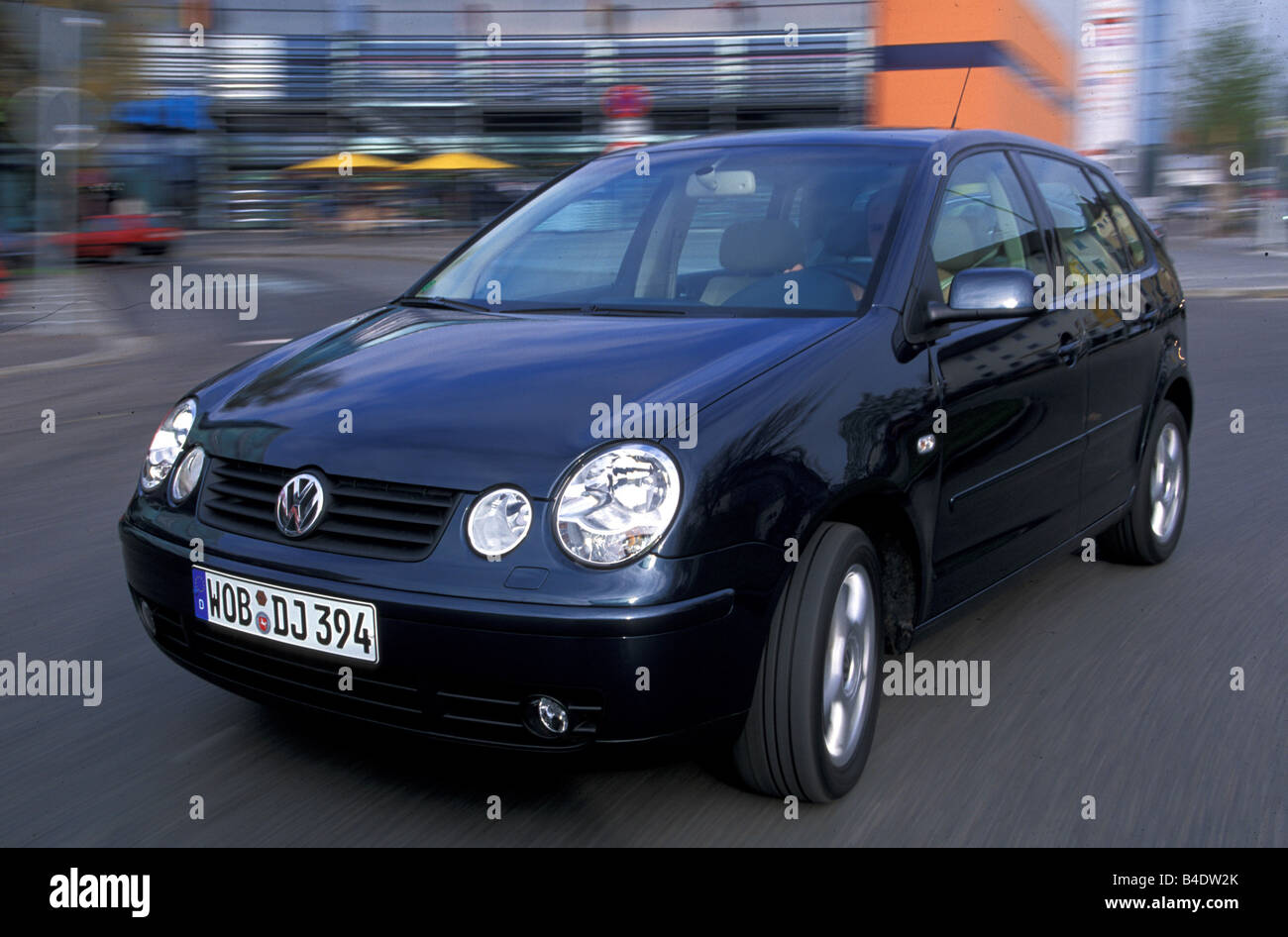 Car, VW Volkswagen Polo TDI, Limousine, small approx., black, model year  2002-, driving, diagonal from the front, City, Front vi Stock Photo - Alamy