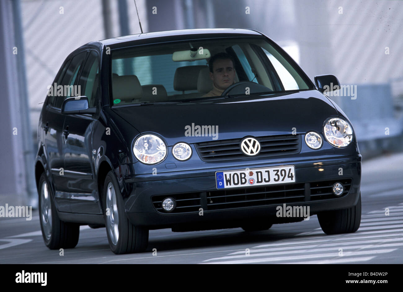 Car, VW Volkswagen Polo TDI, Limousine, small approx., black, model year  2002-, driving, diagonal from the front, City, Front vi Stock Photo - Alamy