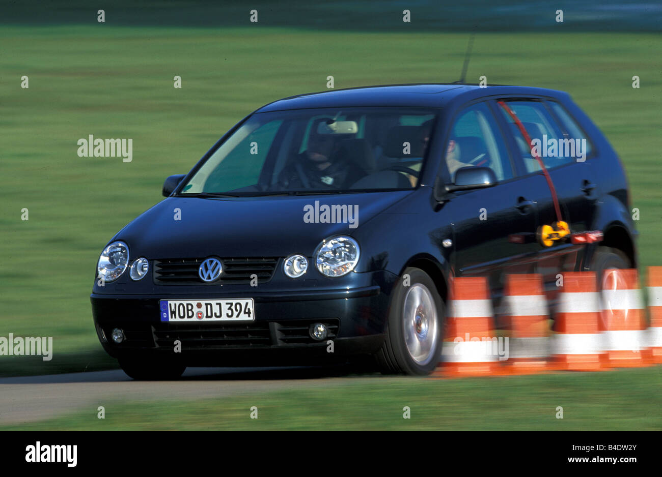 Car, VW Volkswagen Polo TDI, Limousine, small approx., black, model year  2002-, driving, diagonal from the front, frontal view Stock Photo - Alamy