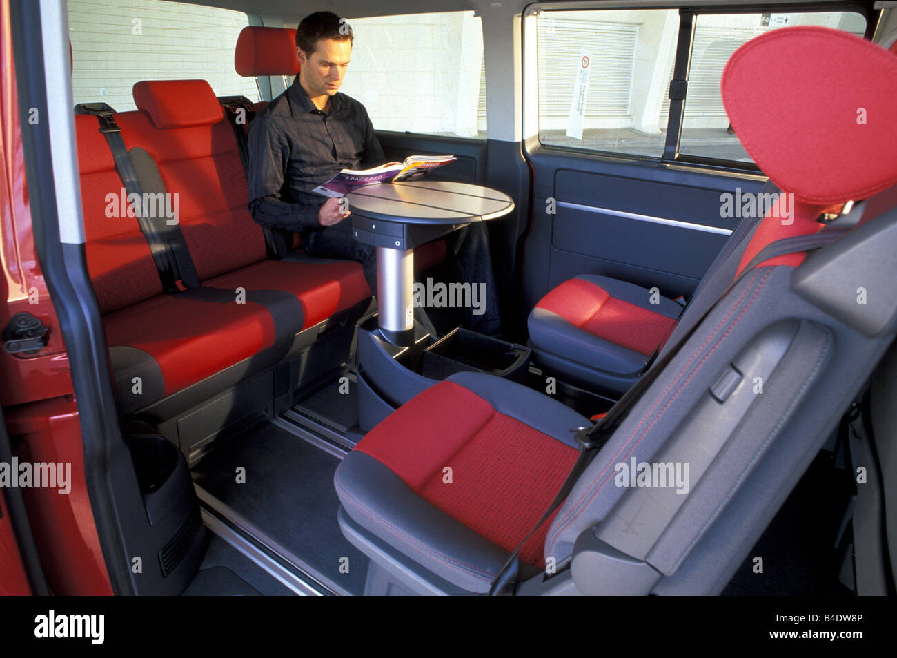 Car, VW Volkswagen Multivan T5 2.5 TDI, Van, model year 2003-, red, interior  view, Interior view, seats, Rear seate, technique/a Stock Photo - Alamy