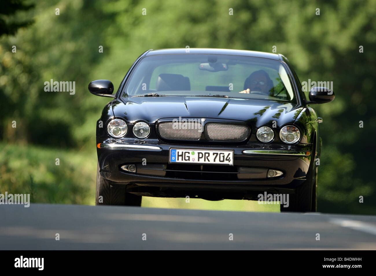 Car, Jaguar XJ Luxury approx.s, model year 2003-, driving, country diagonal from the front, Front vie Stock Photo - Alamy