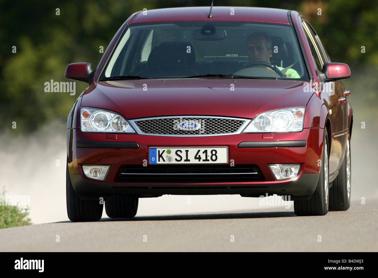 Car, Ford Mondeo SCI, Limousine, medium class, ruby colored, country road,  driving, diagonal from the front, Front view Stock Photo - Alamy