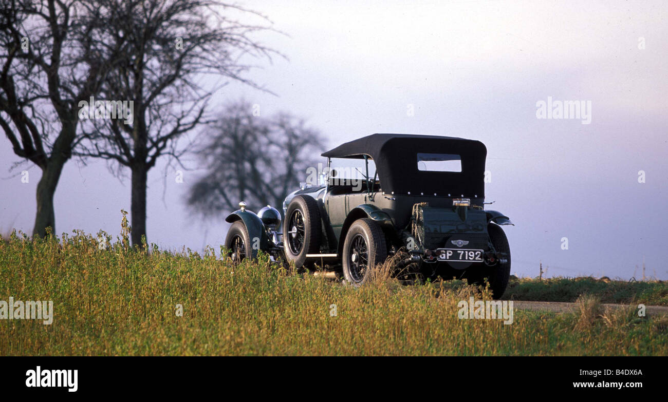 Car, Bentley 8 Litre, model year 1930, Vintage approx., The 30s, landscape, driving, country road, diagonal from the back, rear Stock Photo