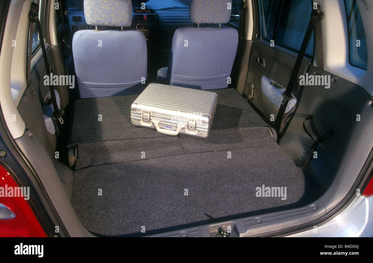 Car, Suzuki Wagon R, Miniapprox.s, Limousine, model year 2000-, silver, view into boot, technique/accessory, accessories Stock Photo