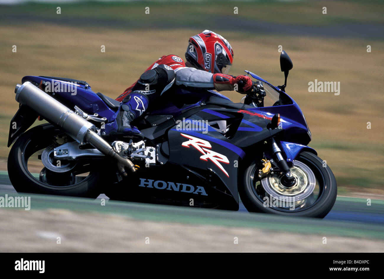 engine cycle, Sports motor cycle, Sportsman, Honda Fireblade, blue, model year 2003, driving, inclined position, Side position, Stock Photo