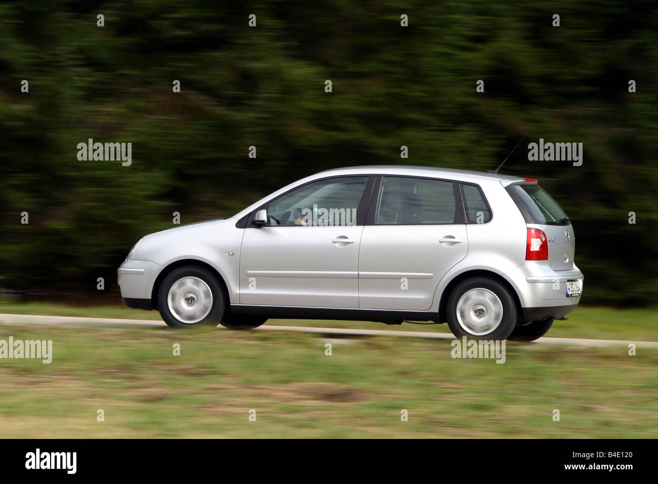 Car, VW Volkswagen Polo 1.4 TDI, small approx., Limousine, silver, model  year 2002-, driving, side view, country road Stock Photo - Alamy