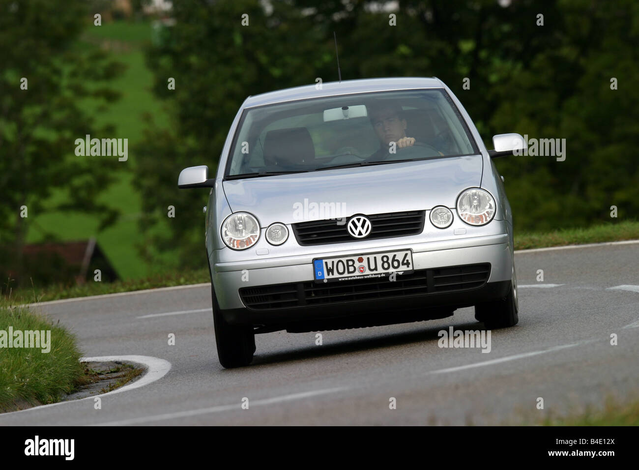 Car, VW Volkswagen Polo 1.4 TDI, small approx., Limousine, silver, model  year 2002-, driving, diagonal from the front, frontal v Stock Photo - Alamy