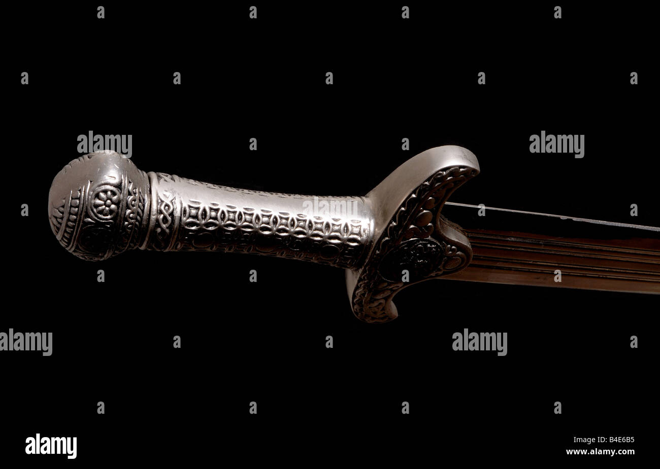 Sword hilt pommel blade and handle isolated over black Stock Photo Alamy