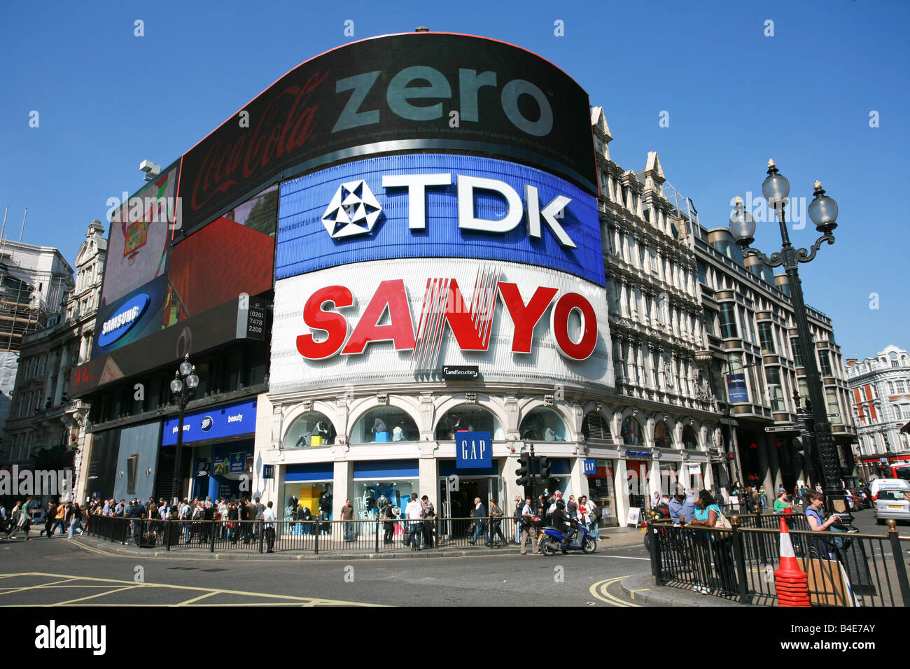 Tourists crowd streets around Piccadilly Circus famous sightseeing landmark area of London England capital city UK Stock Photo