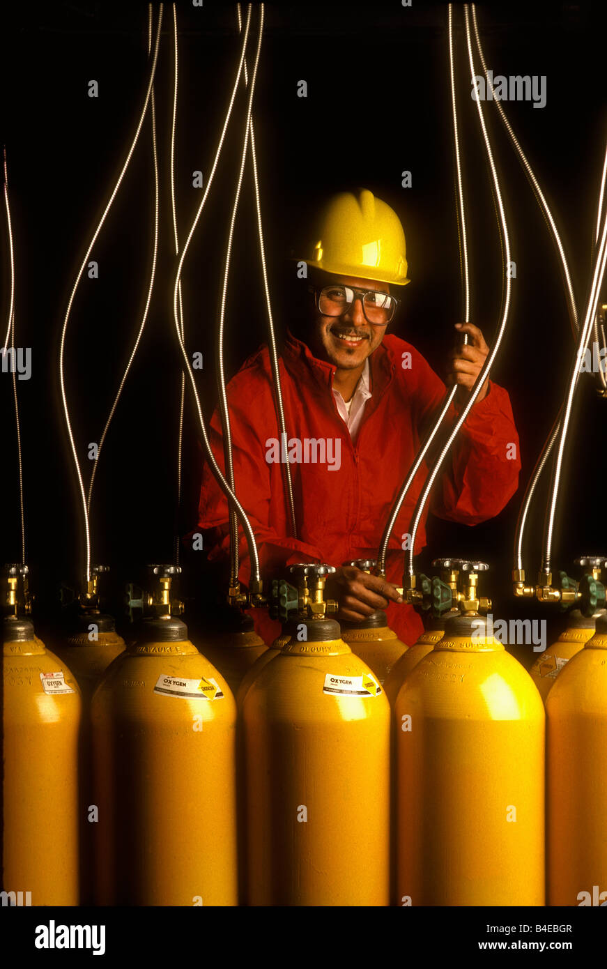 worker with gas air tanks Stock Photo
