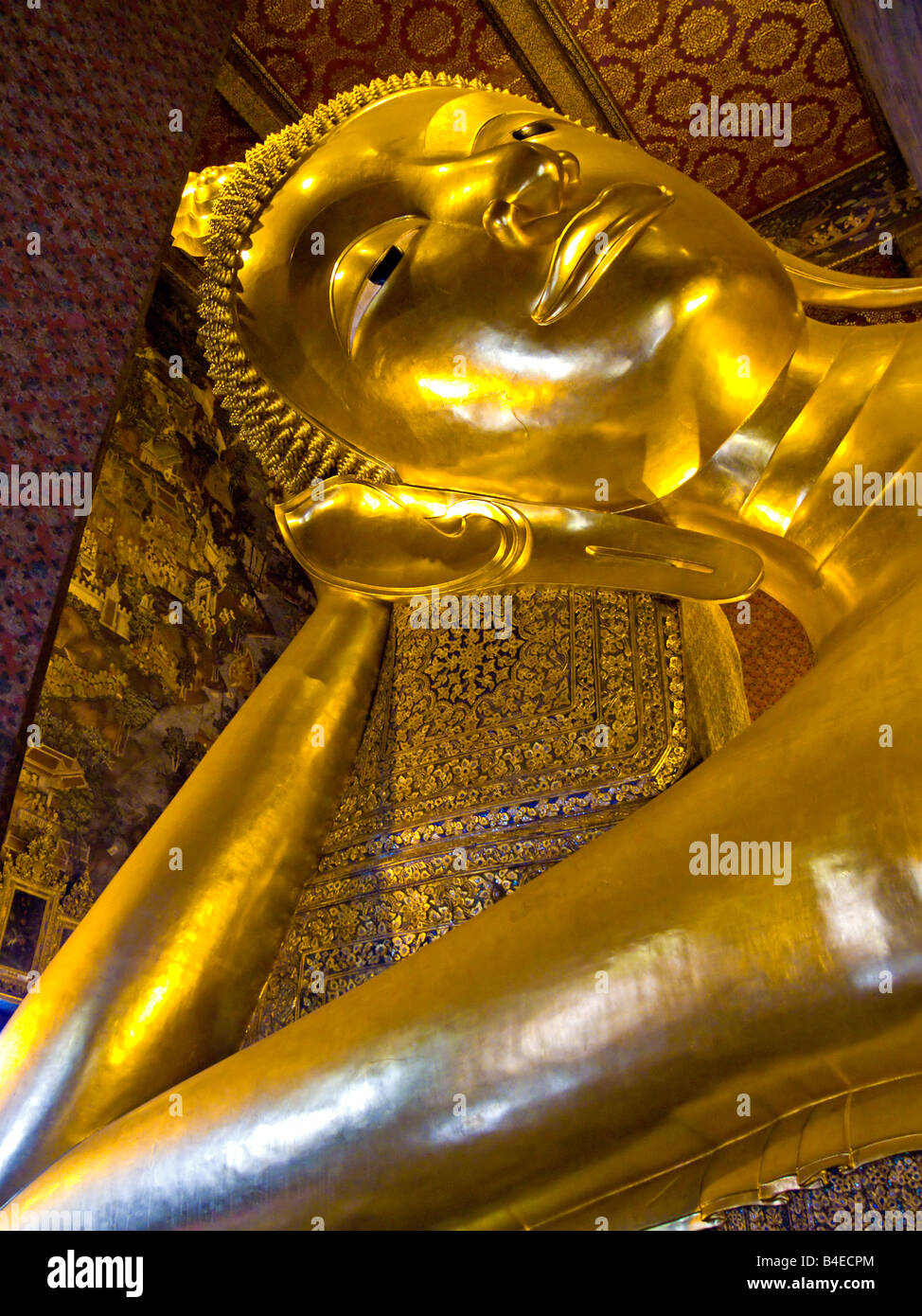 Giant golden reclining Buddha in Wat Pho temple Bangkok Thailand ...