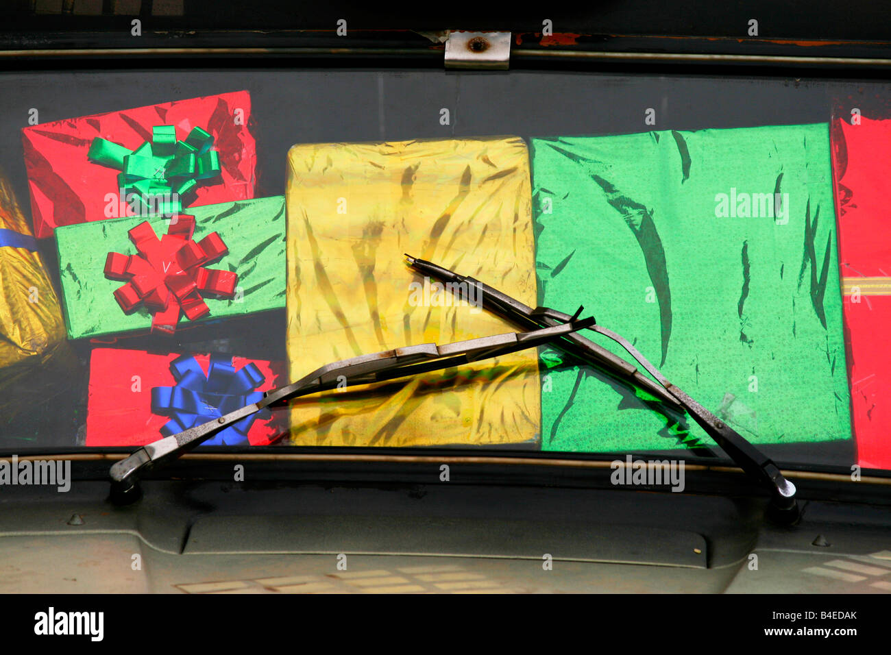 Colorful wrapped gift boxes in an old (antique) car Stock Photo - Alamy