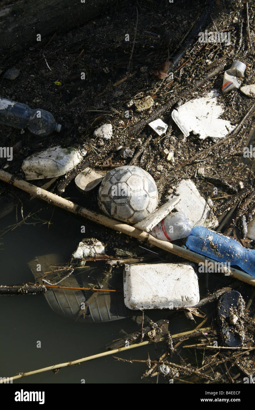 rubbish floating on polluted river surface Stock Photo Alamy