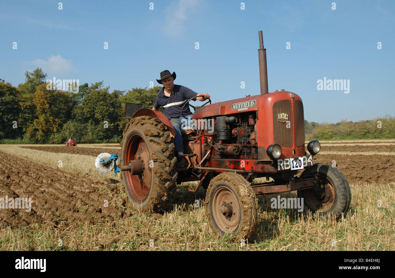 Tractor in a field Stock Photo - Alamy