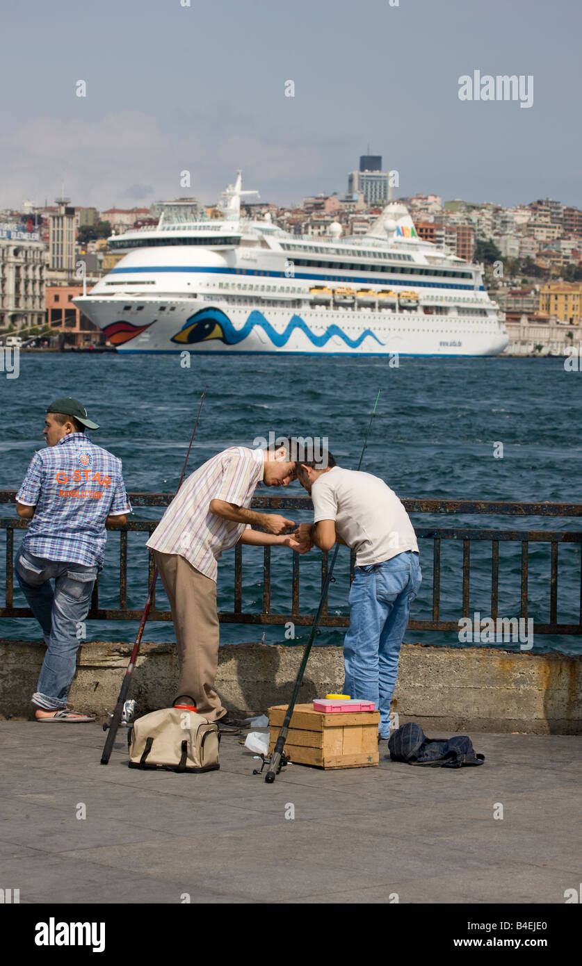 Fishermen on Eminonu Quayside Istanbul Turkey Stock Photo