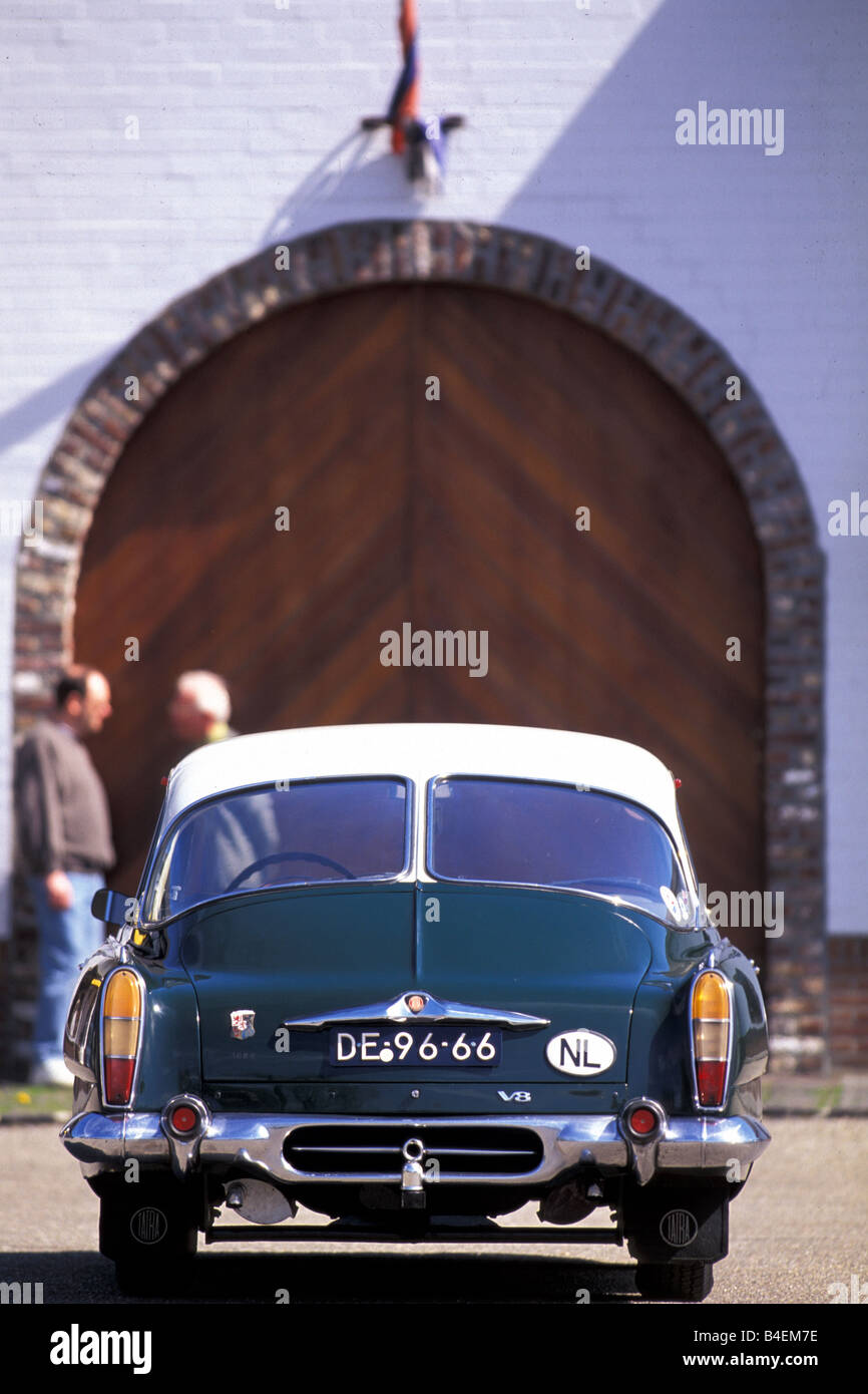 Car, Tatra 603, model year 1964, vintage car, 1960s, sixties, green, sedan,  standing, back view, city Stock Photo