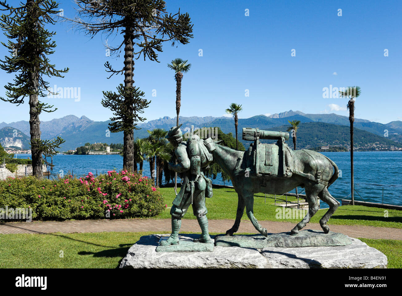 Memorial to Alpine troops on the promenade at Stresa looking towards Isole Borromee, Lake Maggiore, Italy Stock Photo