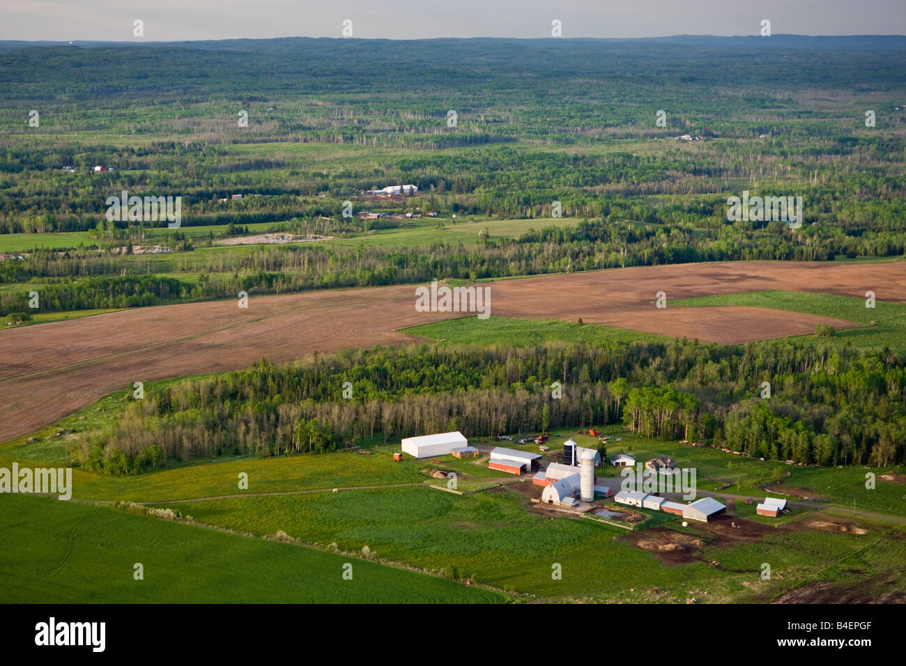 Aerial view of farmland and forest near the city of Thunder Bay, Ontario, Canada. Stock Photo