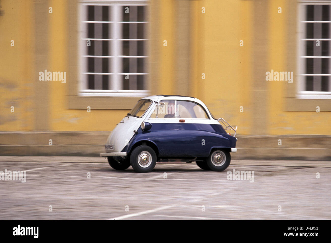 Car, BMW Isetta, vintage car, below 1950s, fifties, white-blue, driving, side view, landscape, scenery, photographer: Hans Diete Stock Photo