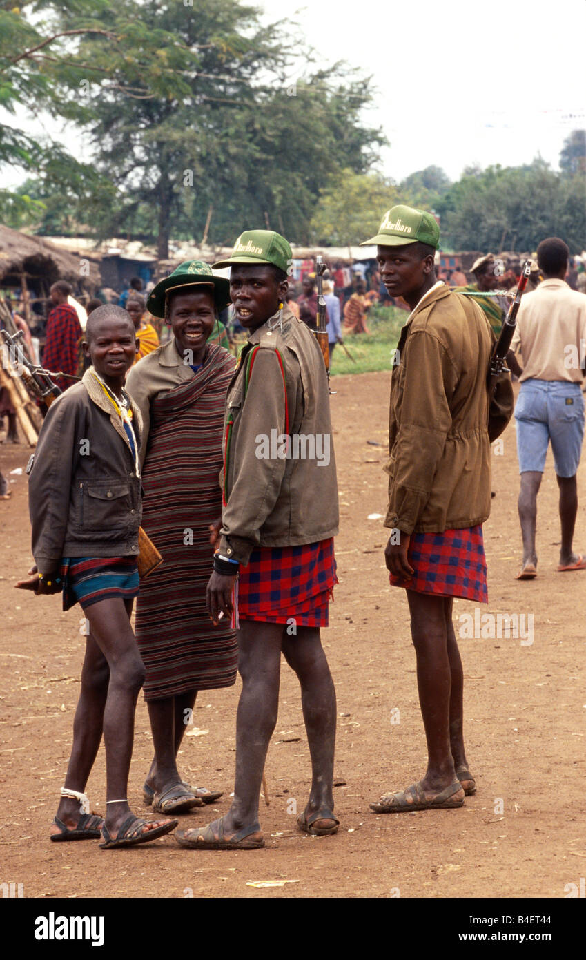 Karamojong villagers gathering in village, Karamoja, Uganda Stock Photo