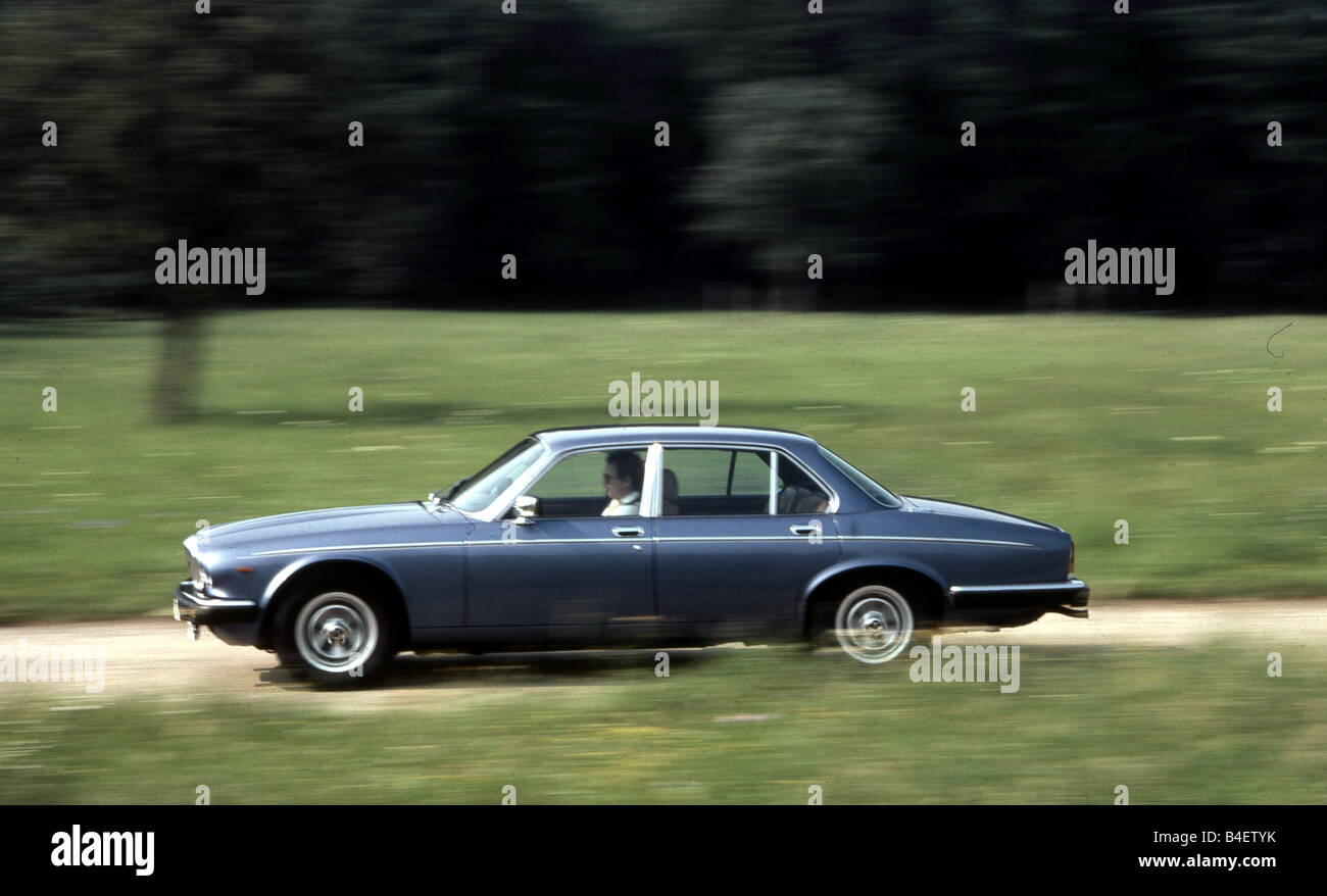 Daimler Double Six, model year 1981, driving, side view, road, country road Stock Photo