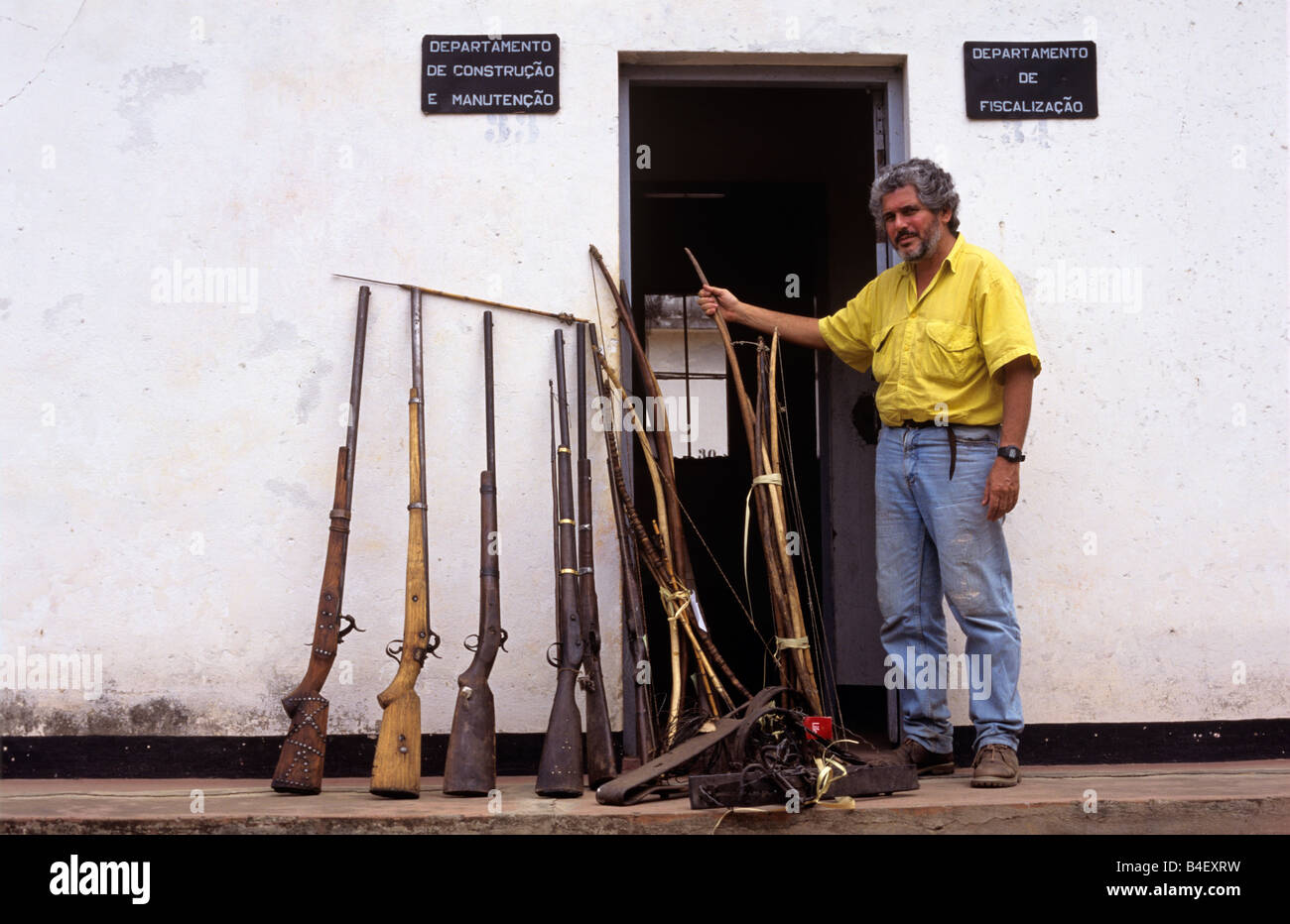 Captured poachers' guns and bows in Mozambique Stock Photo Alamy