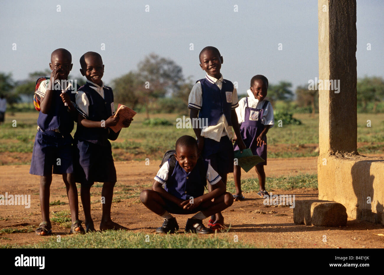 Five schoolboys in uniform outside rural school, portrait Rwanda ...