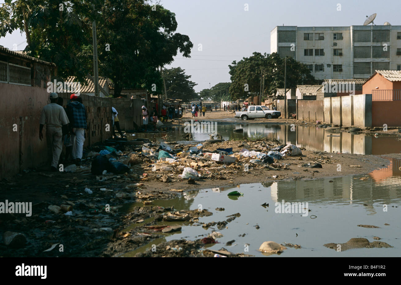 Civil war aftermath, flooded street contaminated with discarded garbage, Angola, Africa Stock Photo