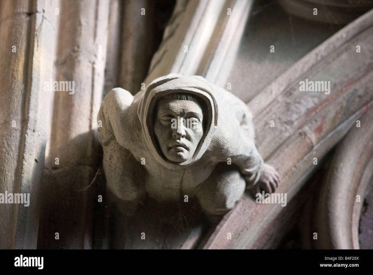 A grotesque statue in the Saint Nazaire Basilica in the French medieval city of Carcasonne Stock Photo