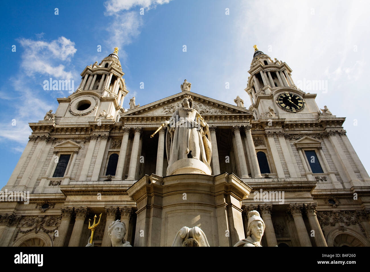 Front facade of St Paul's Cathedral in London with the Statue of Quuen Anne in foreground Stock Photo