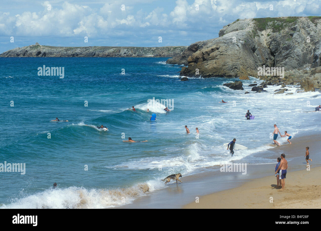Surfers at Coast Cote Sauvage Quiberon Brittany France Stock Photo