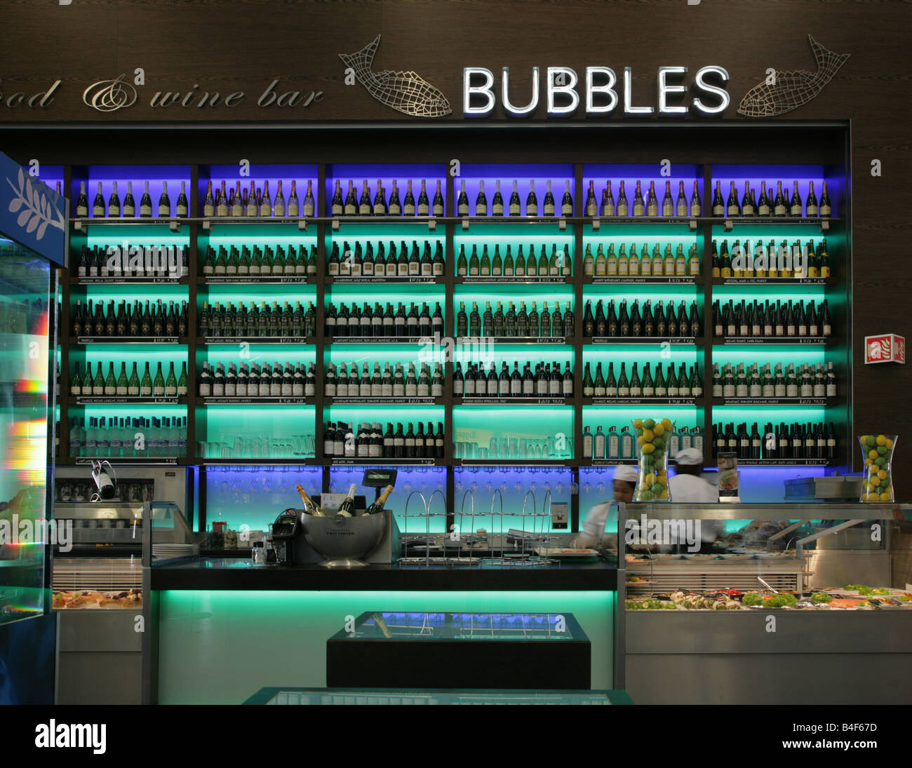 vine bottles in a bar at Amsterdam airport Stock Photo