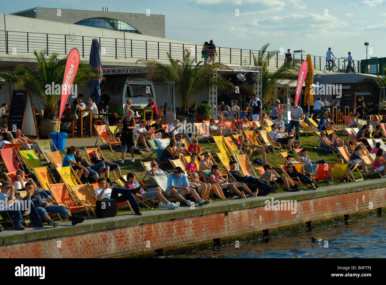 Crowded 'beach' in Berlin on the banks of river Spree near the German Chancellery Stock Photo