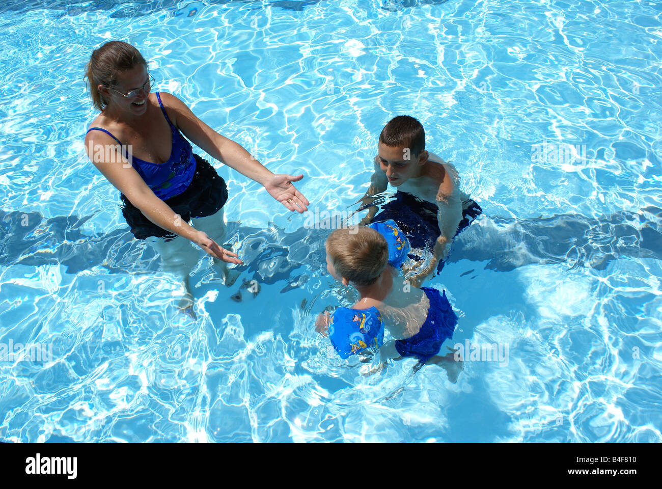 Child learning to swim Stock Photo Alamy