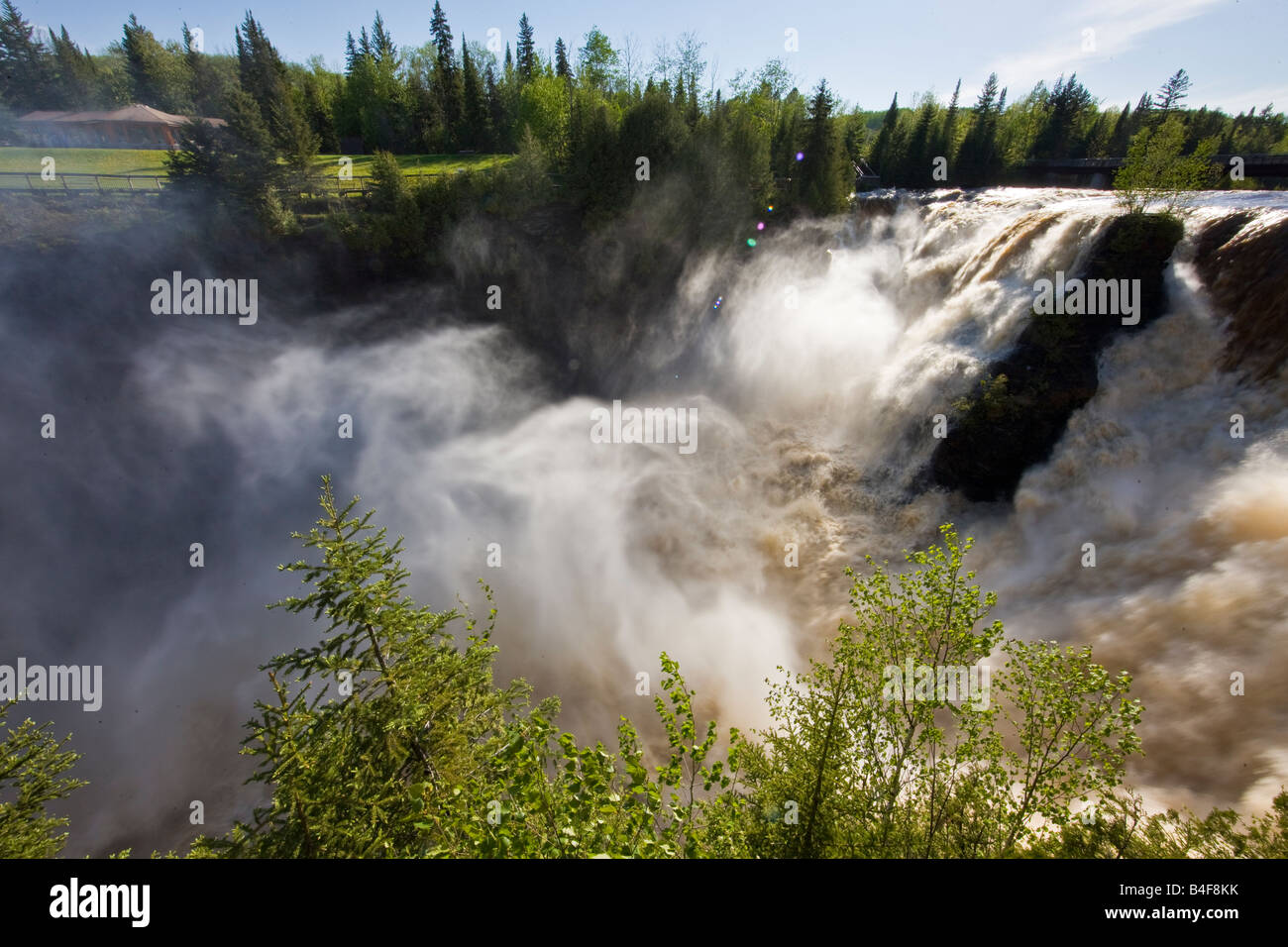 Kakabeka Falls along the Kaministiquia River during a spring flood, Kakabeka Falls Provincial Park, Ontario, Canada. Stock Photo