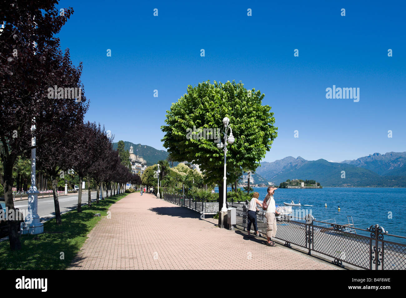 Promenade on the lakefront at Stresa looking towards Isole Borromee Lake Maggiore Italy Stock Photo