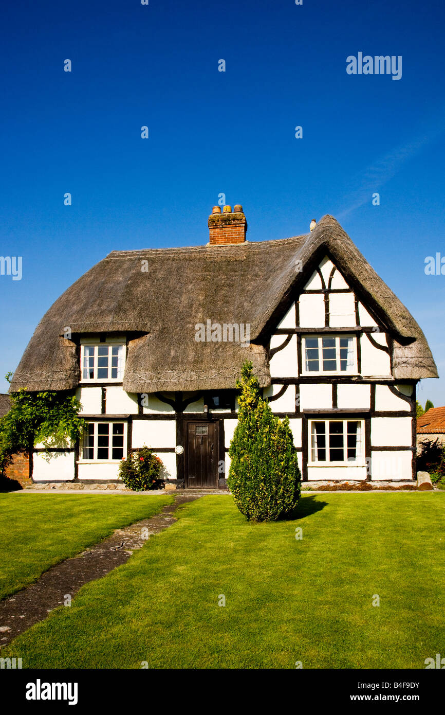 Front View Of A Typical English Thatched Timber Framed Country
