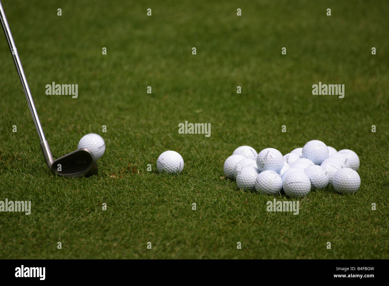 Golf club chipping a ball Stock Photo Alamy