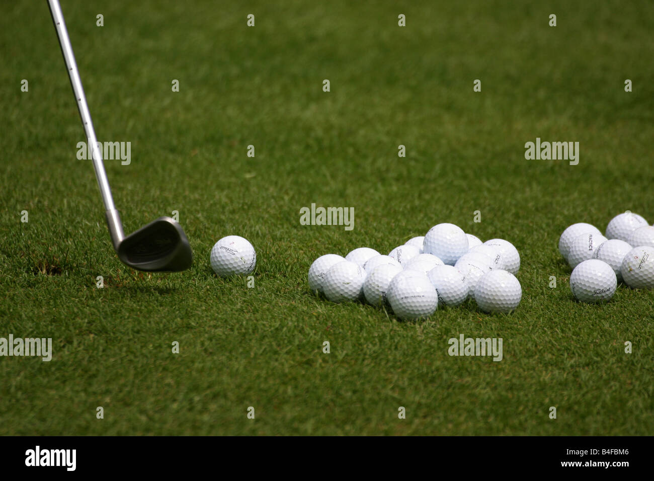 Golf club chipping a ball Stock Photo Alamy