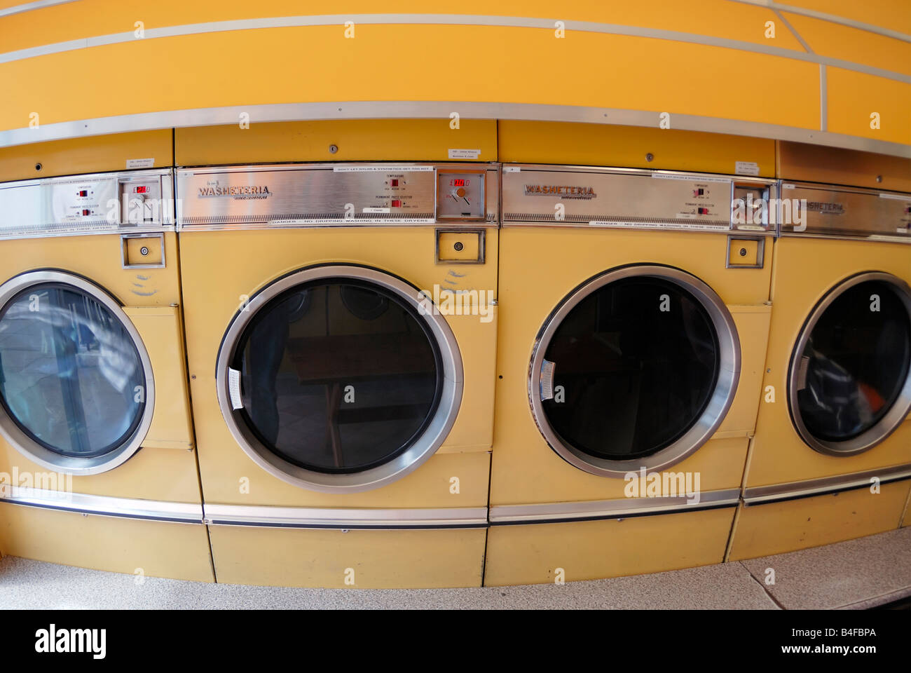 Washing machines at Launderette Stock Photo Alamy