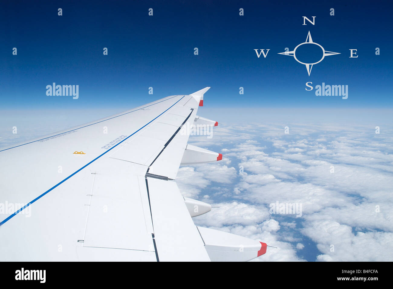 Airplane Wing with Compass Stock Photo - Alamy
